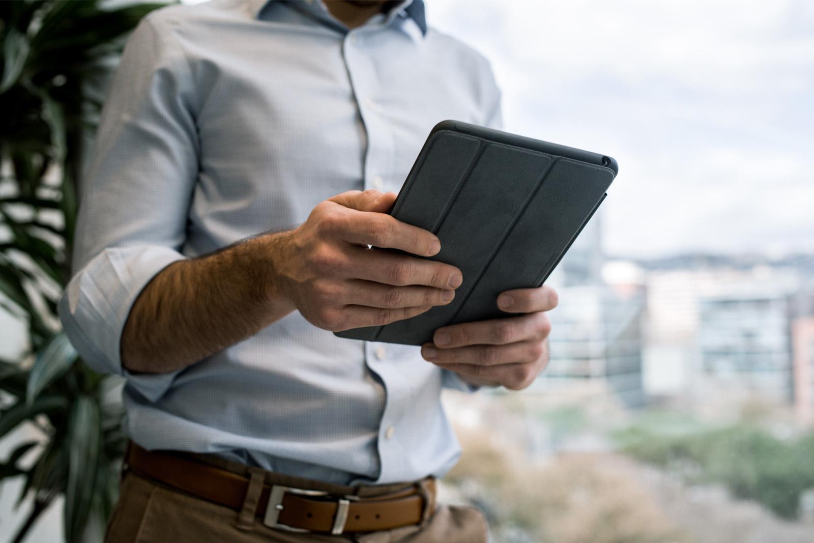 Man reading an electronic tablet
